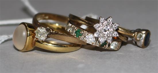 Four 9ct gold gem set rings and a 14ct gold gem set ring.